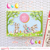 Happy Easter Card with 3 bunnies under trees with Easter Eggs